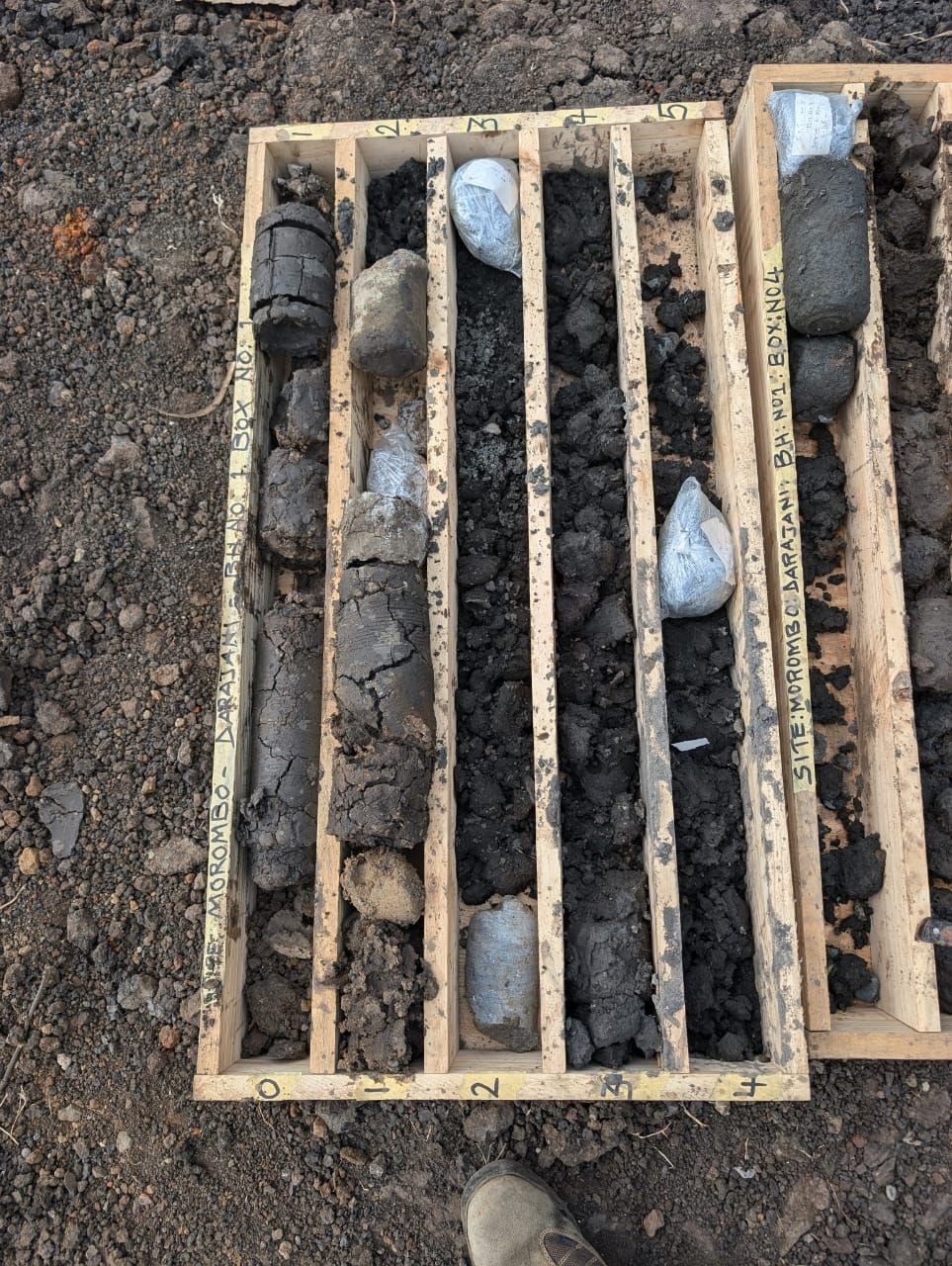 Soil core samples boxed and labeled by borehole for testing
